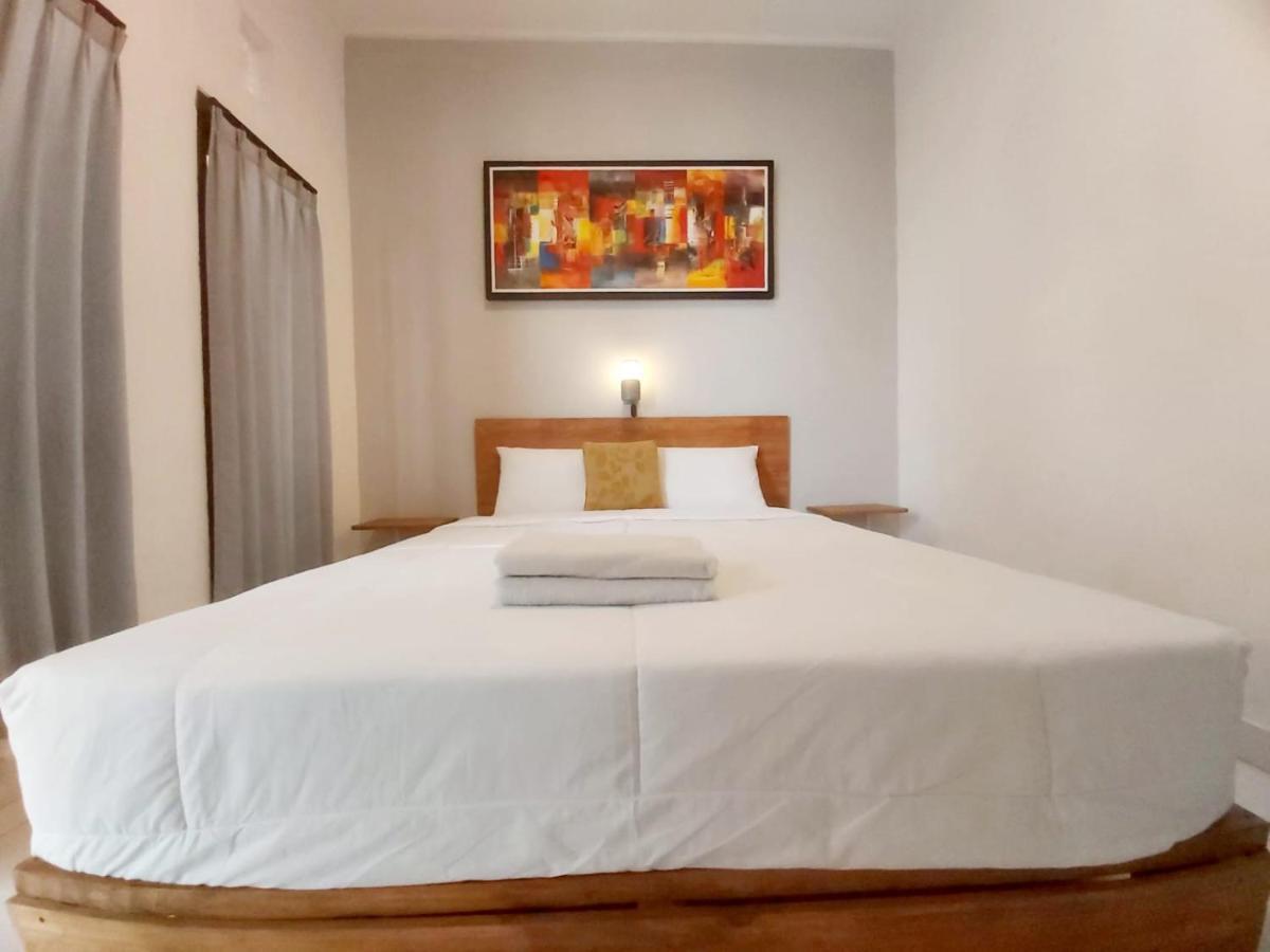 Отель Genta House Кута Экстерьер фото