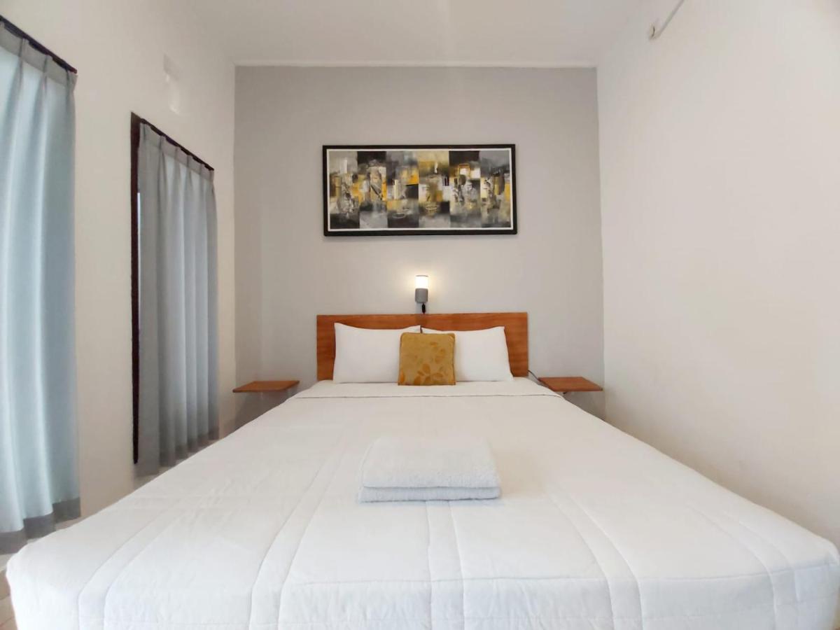 Отель Genta House Кута Экстерьер фото